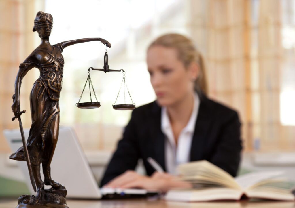 Female lawyer working at a computer