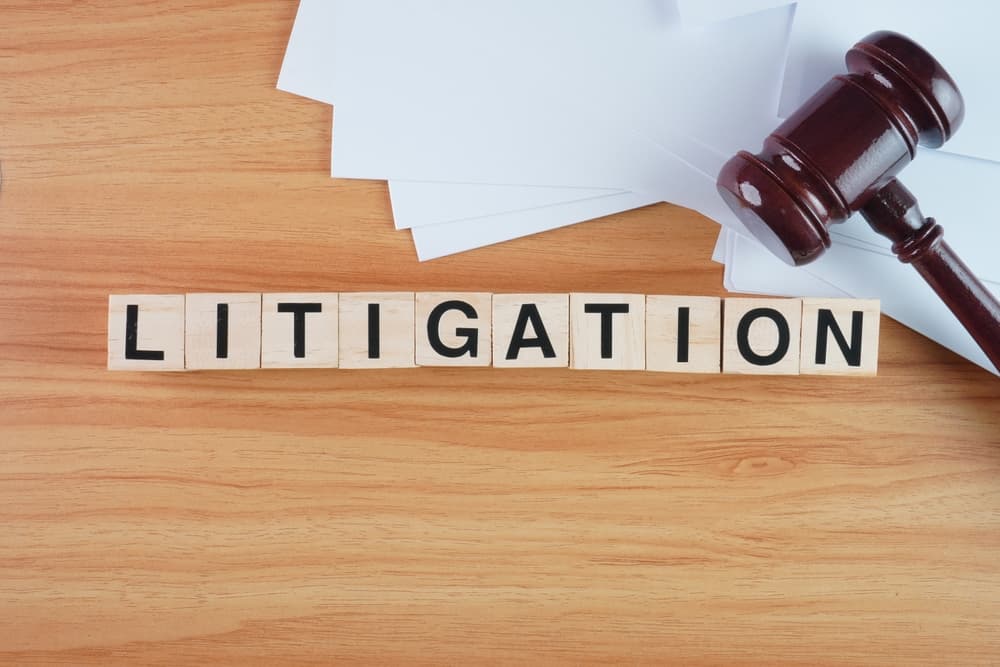 Litigation Concept Background Wooden Block Letters